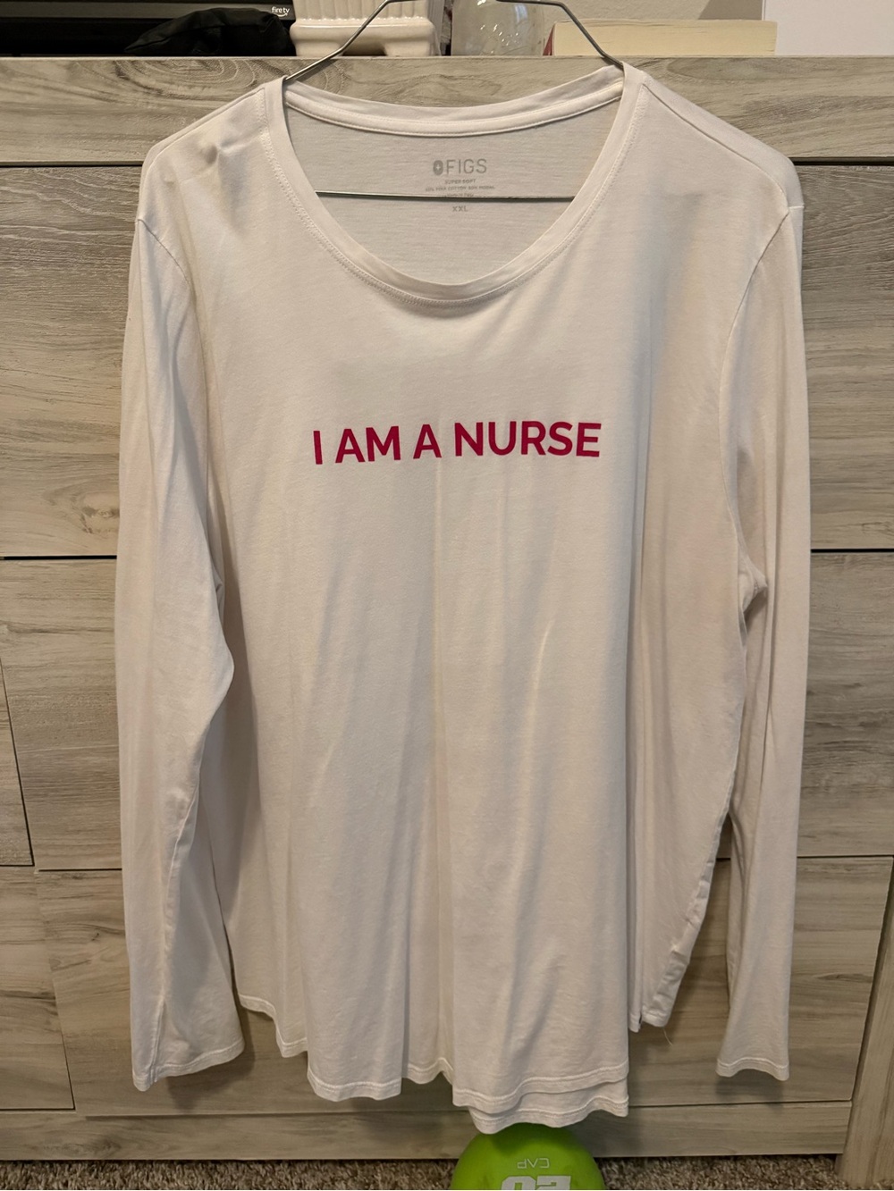 FIGS White Long-Sleeve Tee with Pink "I AM A NURSE" Graphic